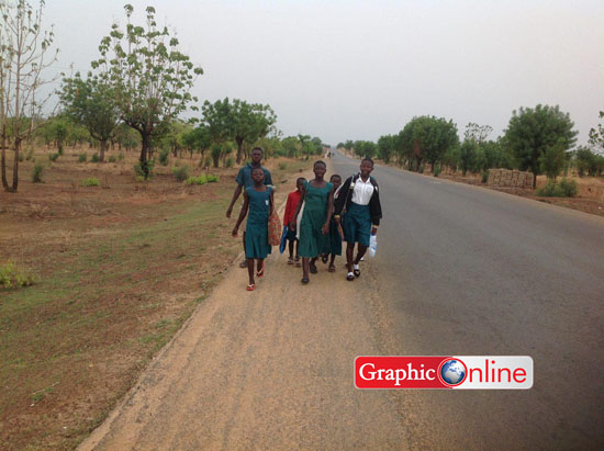 some school children on their way from Gumo to school at Malshegu