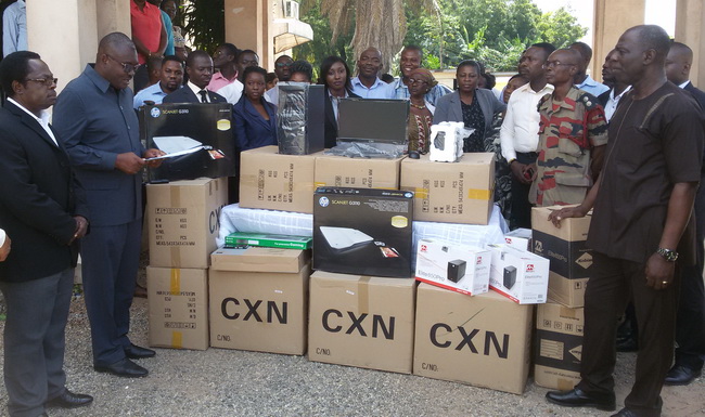 Administrator of GIFEC Mr Kobby Akyeampong presents the equipment to the Passport Office Administrator of GIFEC Mr Kobby Akyeampong presents the equipment to the Passport Office