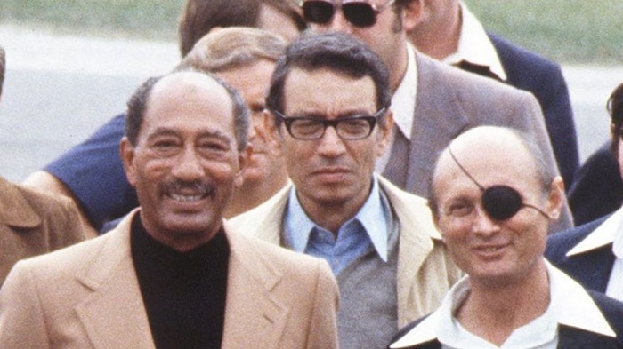 • Boutros Boutros-Ghali (middle) with former Israeli leader Moshe Dayan (right) and President Anwar Sadat at Camp David Peace Accord