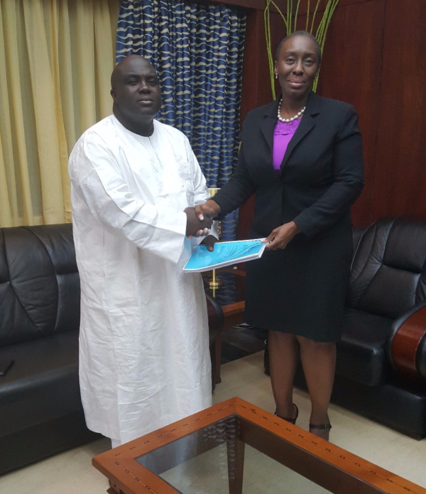 Chief of Staff Julius Debrah left receives report from the AG Marrietta Appiah Oppong Chief of Staff Julius Debrah left receives report from the AG Marrietta Appiah Oppong