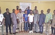 • The new executives with Seth Panwum (4th from left), the Board Chairman, NSA, and the executives of the GAA