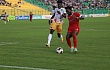 Caleb Amankwah of Hearts of Oak (left) is beaten to the ball by his Asante Kotoko marker