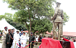 Vice-Admiral Seth Amoama (left), Chief of the Defence Staff, officially unveiling the General J.A. Ankrah statue. With him are Rear Admiral M. Beick-Baffour (2nd from right), Commandant, Ghana Armed Forces Command and Staff College, and some other officials.  Picture:  ESTHER ADJORKOR ADJEI