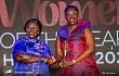 Mrs Frema Osei-Opare, Chief Of Staff (left), presenting a plaque to Mrs Ursula Owusu-Ekuful