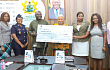 Dominic Dokbilla Naab (3rd from left) presenting a dummy cheque for GH¢50,000 to Rev. Dr Joyce Aryee (middle), Chairperson of the Appiatse Support Fund