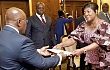 Jeannette Njuma Nyakeru (right), Congolese Ambassador to Ghana, presenting her letters of credence to the President