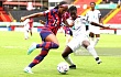 Trinity Byars of USA and Ghana's Rebecca Atinga compete for the ball in the Group D opener