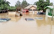Some vehicles and property submerged by the flood