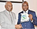 Charles Booto a Ngon (left), outgoing President of the African Organisation for Standardisation, handing over to Professor Alex Dodoo, the newly sworn-in President of ARSO