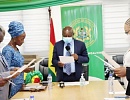 Kwaku Agyeman-Manu (middle), the Minister of Health, administering the oath of office to the reconstituted board of the Mental Health Authority