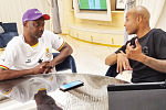  Andre Ayew (right) explaining a point to Graphic Sports Editor, Maurice Quansah