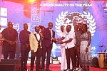 Mustapha Ussif, Minister of Youth and Sports, presenting the Sports Personality of the Year award to representatives of Mohammed Kudus