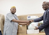  Dr Francis Kasolo (right), WHO Country Representative, presenting the equipment and supplies to Mahama Asei Seini, Deputy Minister of Health. Picture: EDNA SALVO-KOTEY