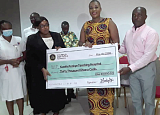  Georgina Efua Sam (2nd from left), Director of Nursing at KATH, receiving the cheque from Nana Afia Kobi Prempeh, Executive Director of the Otumfuo Foundation. On the right is Kwabena Owusu Ababio, a member of staff of the foundation