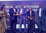 Alan Kyerematen (2nd from left), the Minister of Trade and Industry presenting an award to one of the awardees. With him are Dr Afua Asabea Asare (1st from left), the Chief Executive Officer of GEPA and Pamela Coke-Hamilton (2nd from right), the Executive Director of ITC