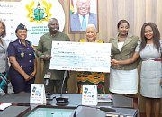 Dominic Dokbilla Naab (3rd from left) presenting a dummy cheque for GH¢50,000 to Rev. Dr Joyce Aryee (middle), Chairperson of the Appiatse Support Fund