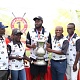 Craig Tandoh(third left) receiving his trophy from Mr Appiah(third right),with support from  other executives