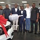 Mustapha Ussif, the Youth and Sports Minister (4th from left) presenting to Charles Tetteh a prototype key to his Renault vehicle at the ceremony. With them are Lord Commey, Mr Hijazi of Renault Ghana and officials of GBA and Imax Promotions