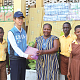 Moo Heon Kong (2nd from left), Country Director, KOICA-Ghana, presenting some items to Christina Kailebi Adom Bortey (middle), Headmistress of Dar-Es-Salaam Primary School. Picture: ESTHER ADJORKOR ADJEI