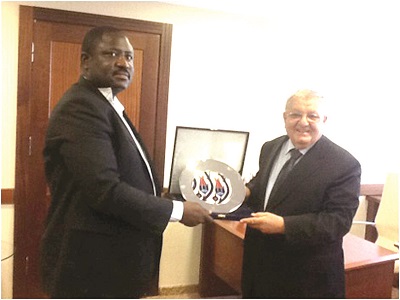   Mr  Adam Abdul Nasser (left) receiving an award from Lawyer Ahmet , first vice chairman of Istanbul Municipal Authority.