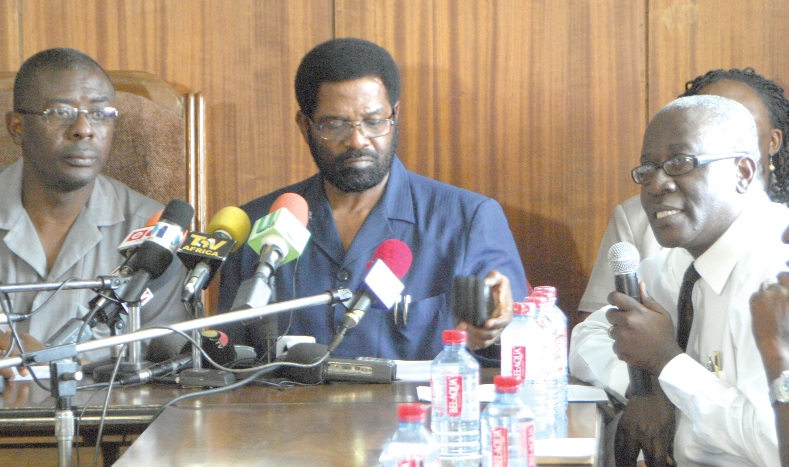 Mr Samson Gyamera, Head  of   GAPTE Unit of the Urban Transport Project  answering questions  at a press conference  in Accra on certain concerns raised by some taxi drivers on  arrangements for the BRT project . With him are Mr Isaac Djanmah Vanderpuiye and  MCE of Accra, Mr Alfred Okoe Vanderpuije .