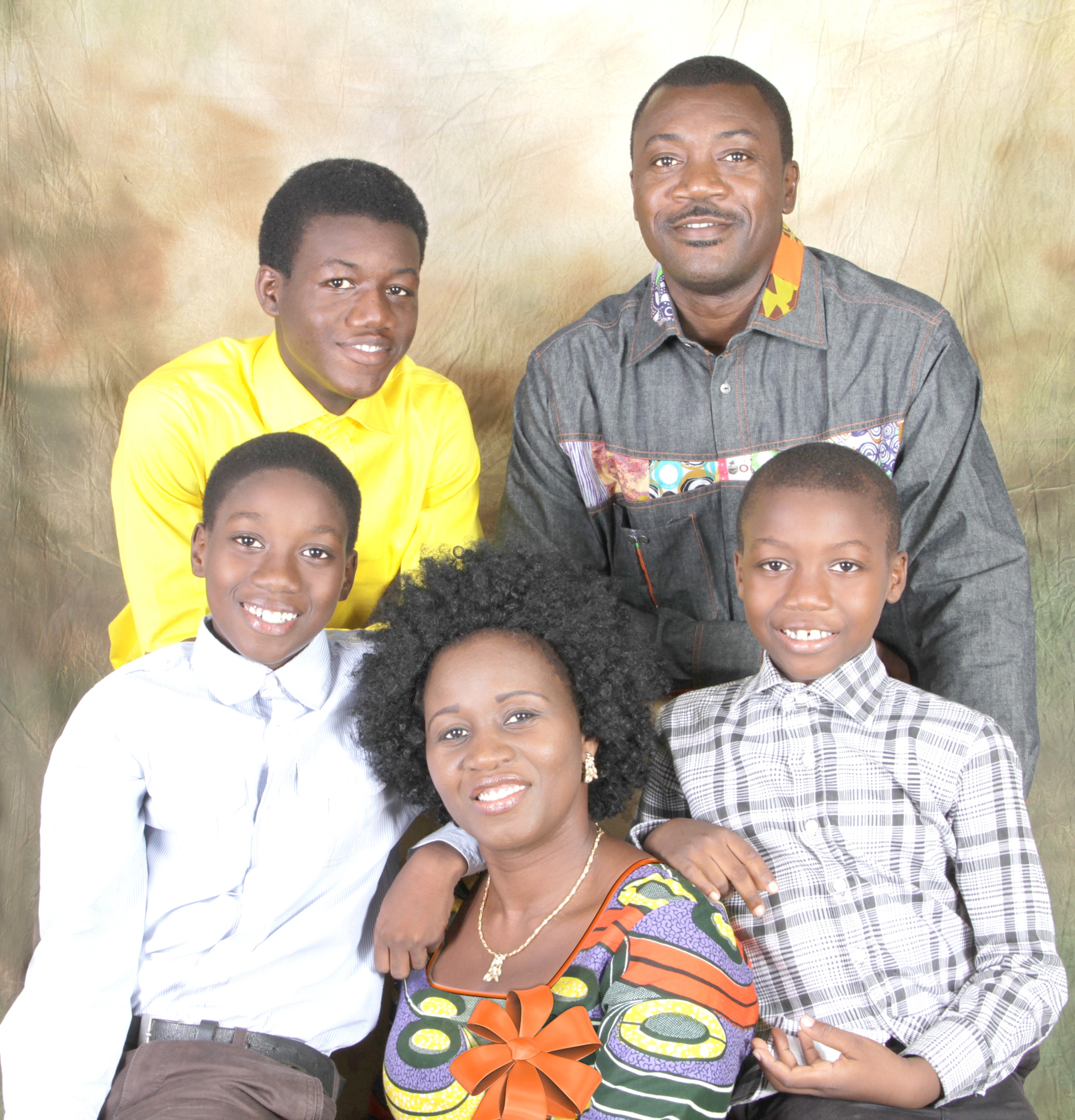 Mr and Mrs Andoh and their children, Julian (back row left), Jude (left) and Jason (right)