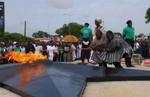 Mr. Martin Amidu and Alhaji Huudu Yahaya lighting the revolutionary flame