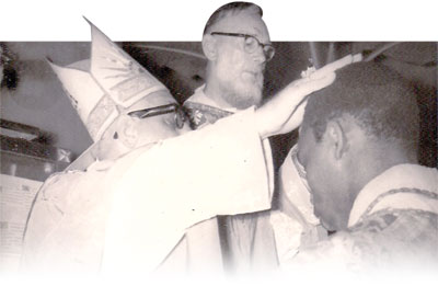 Bishop Anthony Konings ordaining the then Rev Father Francis Lodonu as a priest of the Catholic Church