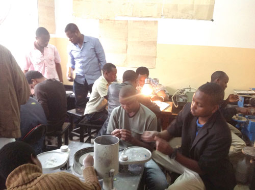 Workers at a gemstone processing workshop
