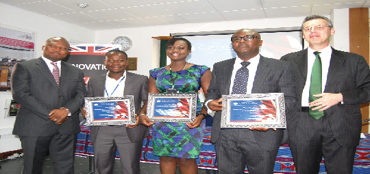  Mr Peter Jones (right), British High Commissioner to Ghana and  Mr Samuel Okudjeto Ablakwa, Deputy Minister of Education (left), with the beneficiaries, Dr Frank Amaning (2nd right), Mrs Barbara Ackonor (middle) and Patrick Nii Lante Lamptey PICTURE: Emmanuel Asamoah Addai