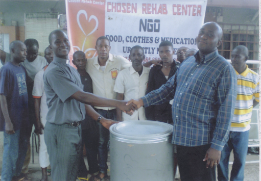 Rev Kwabena Boateng (left) presenting the items to Apostle Cobi Washington, of Chosen Rehab Centre in Accra.