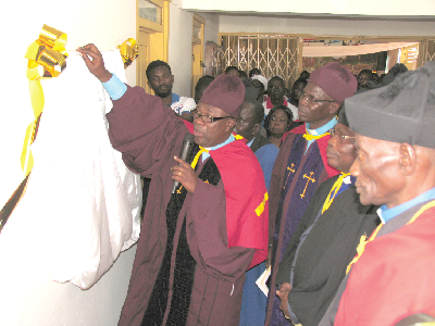 Rt. Rev. Gador unveiling the coronation inscription.