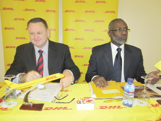  Mr Charles Brewer (left), MD, DHL, sub-Saharan Africa, and Mr Kader O. Coulibaly, Country Manager, during the media interaction in Accra.