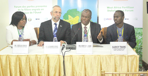 Mr Kofi Debrah (second right) speaking at the post forum briefing. With him are  Alain Sy Traore, and Alexander Deprez, Regional Mission Director of USAID/West Africa, and Ms Cecilia Khupe, Programmes Director, AFAP.