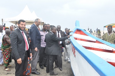 r Bernard Lamptey (hand stretched), Managing Director of Ghana Egypt Fiber Glass Industry, conducting Nii Lante Vanderpuije (2nd right), Deputy Minister of Trade and Industry, Mr. Aquinas Tawiah Quansah (3rd right), Deputy Minister of Fisheries, and Mr Omar Selim (3rd left), Egyptian Ambassador in Accra, round the Fiber Glass Boat after the launch of the facility in Accra. Picture: GABRIEL AHIABOR