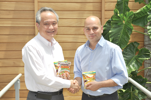 Mr Suchai Ratanajiajaroen (left) and Mr Ramzi Nahas after the deal was signed  