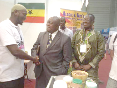Mr Gideon Quarcoo, CEO, GEPA (2nd left), interacting with Mr Alagie S. Jallo, a Ghanaian exhibitor at the fair in Turkey. Picture: Maxwell Adombila Akalaare