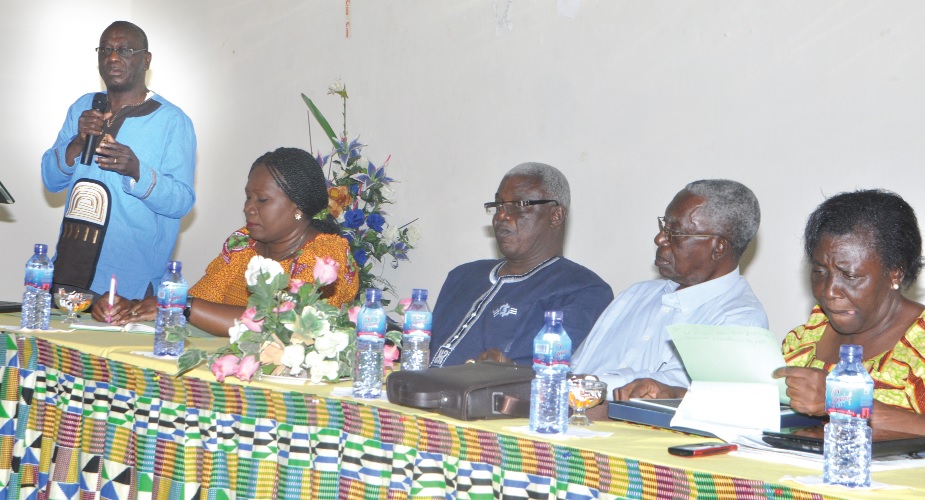 Dr Eramus Agongo (left), Director of Policy Planning and Evaluation of the Ghana Health Service, addressing a workshop on Transforming Community Health Systems in Accra. Those seated from left are Dr Linda Van Otoo, Dr Sam Adjei, Dr Moses Adibo and Dr Edith Tetteh.