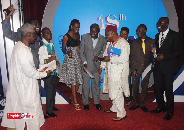 Messrs K.K. Inkoom (left) and Ransford Tetteh (centre) join the winners from the GCGL stables after they were presented with the awards