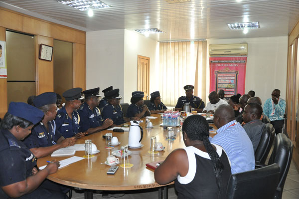 The IGP and his team during the courtesy call at the offices of the Graphic Communications Group Limited.