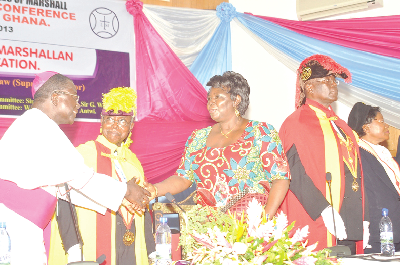  Most Rev. Joseph Osei Bonsu (left), Supreme Spiritual Director of Marshallan and President of Ghana Catholic Bishop Conference, congratulating Mrs Cecilia Johnson, Member of the Council of State, after her address. With them include Supreme Director of Marshallan, Sir Kt. Cdr. Dr E. S.K. Kwaw (2nd left). Picture: JOHN K. ESSEL