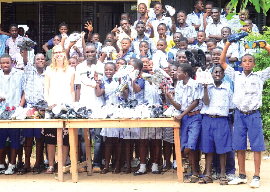 Some of the elated pupils displaying their shoes.