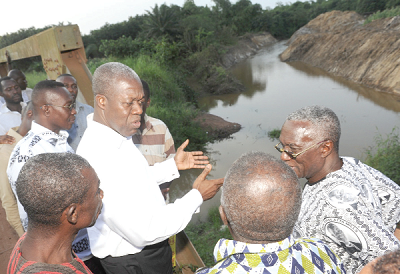 • Vice-President Amisah-Arthur inspecting progress of work done on the Kwaprow Drainage in the Central Region