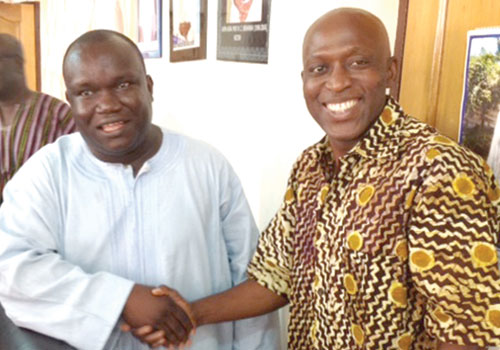 Mr Kenneth Ashigbey, Managing Director of GCGL (L) exchanging pleasantries with the Rector of Tamale Poly, Dr Abdulai Salifu Asuro