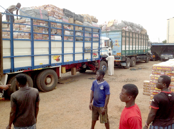 The two trucks loaded with the smuggled goods at the Customs headquarters in Kumasi. PICTURE BY KWAME ASARE BOADU