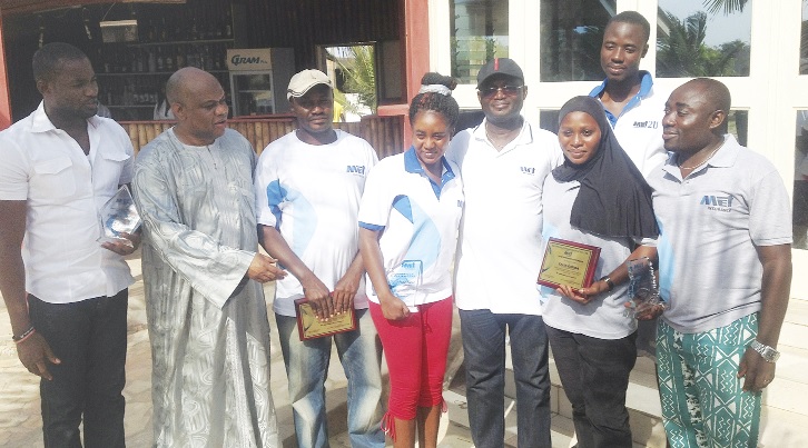 Mr Kwame Gazo-Agbenyadzi, CEO of MET Insurance (4th right) in a group photograph with the award winners.