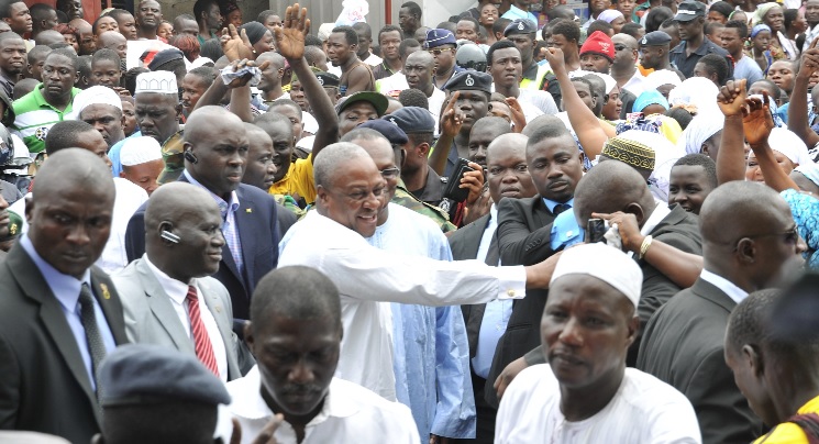 President Mahama responding to cheers on his arrival at Kasoa.