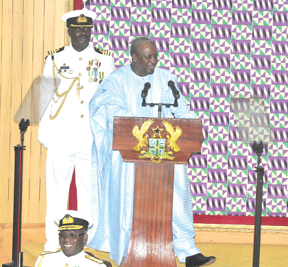President Mahama showing off his Horseman brand of shoes during the State of the Nation Address.