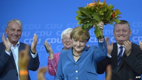 Angela Merkel told supporters they had achieved 