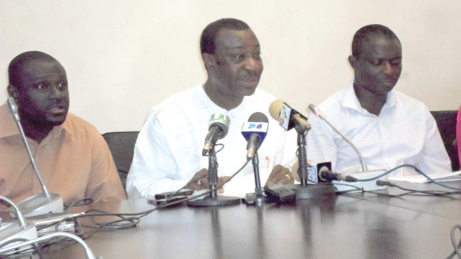 Dr Anthony Akoto Osei (middle) addressing the press conference. He is flanked by Dr Mark Assibey-Yeboah (left), MP for New Juaben South, and MP for Obuasi West, Mr Kwaku Kwarterg (right). Picture: EMMANUEL ADU-GYAMERAH